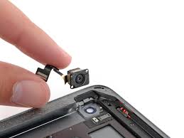 iPad rear camera module repair in progress at TekRenewed Close-up of technician replacing iPad front camera lens Disassembled iPad showing internal camera components iPad on diagnostic screen showing camera not working issue